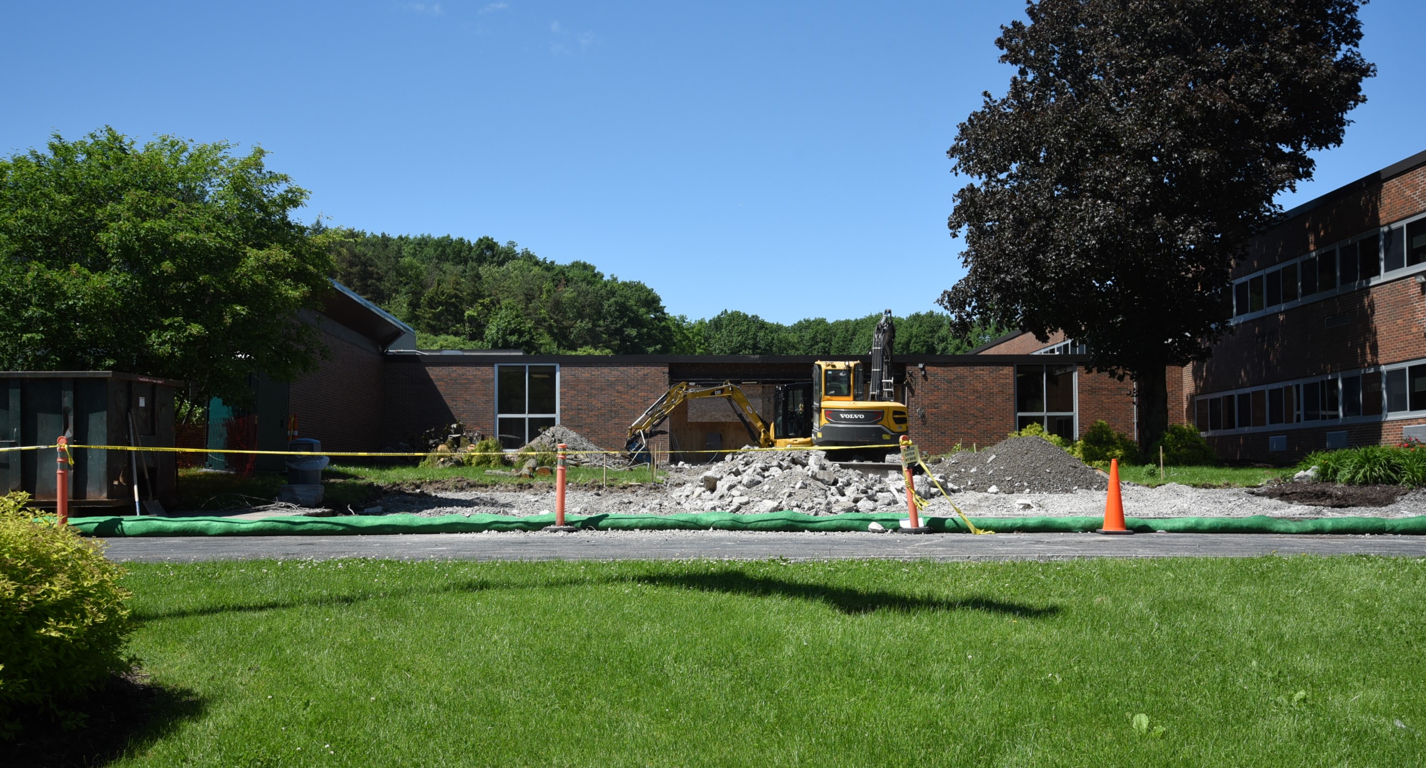 Front of school during construction (shot straight on far away)